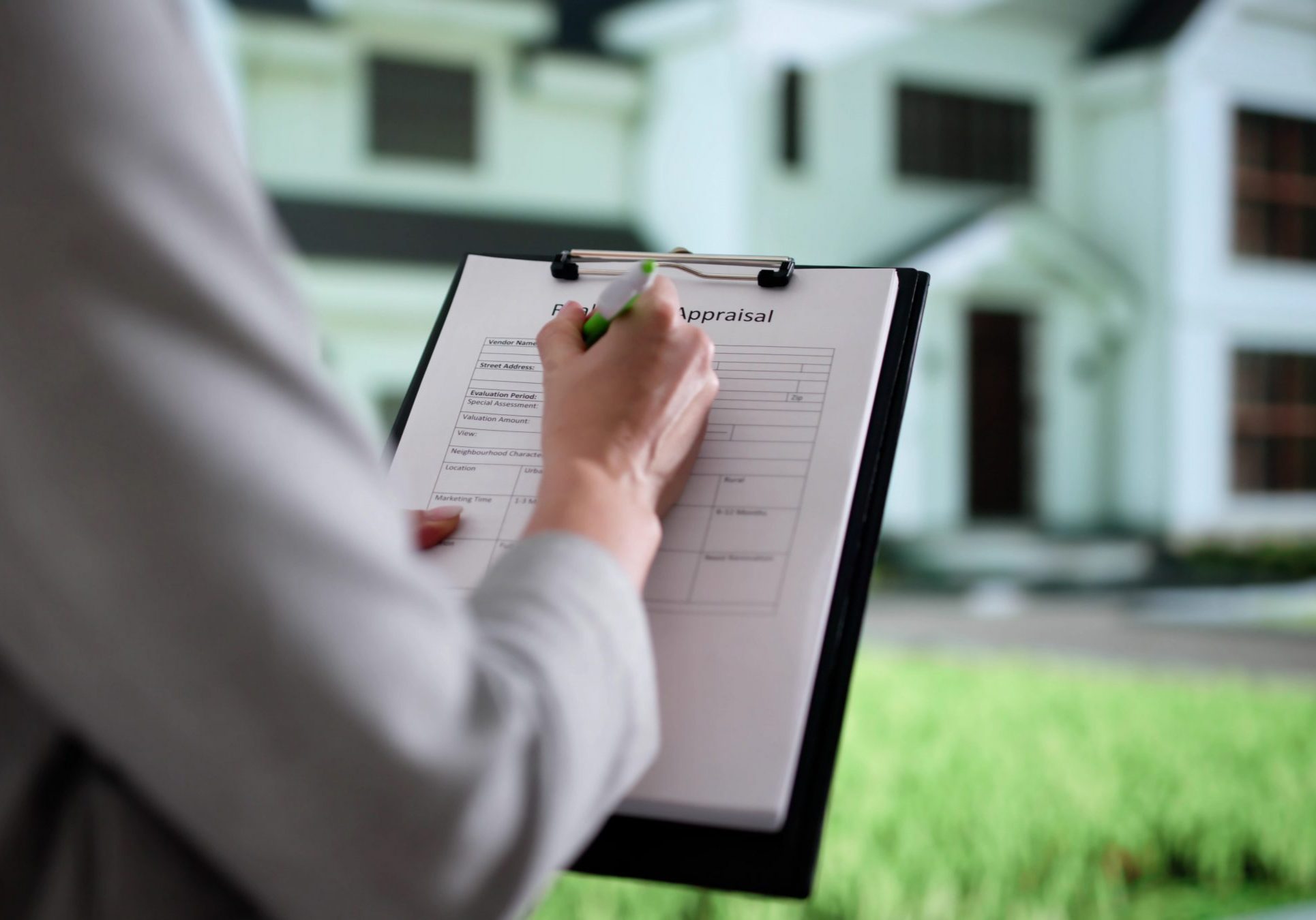 The Professional Real Estate Agent Is Appraising A Property Now.